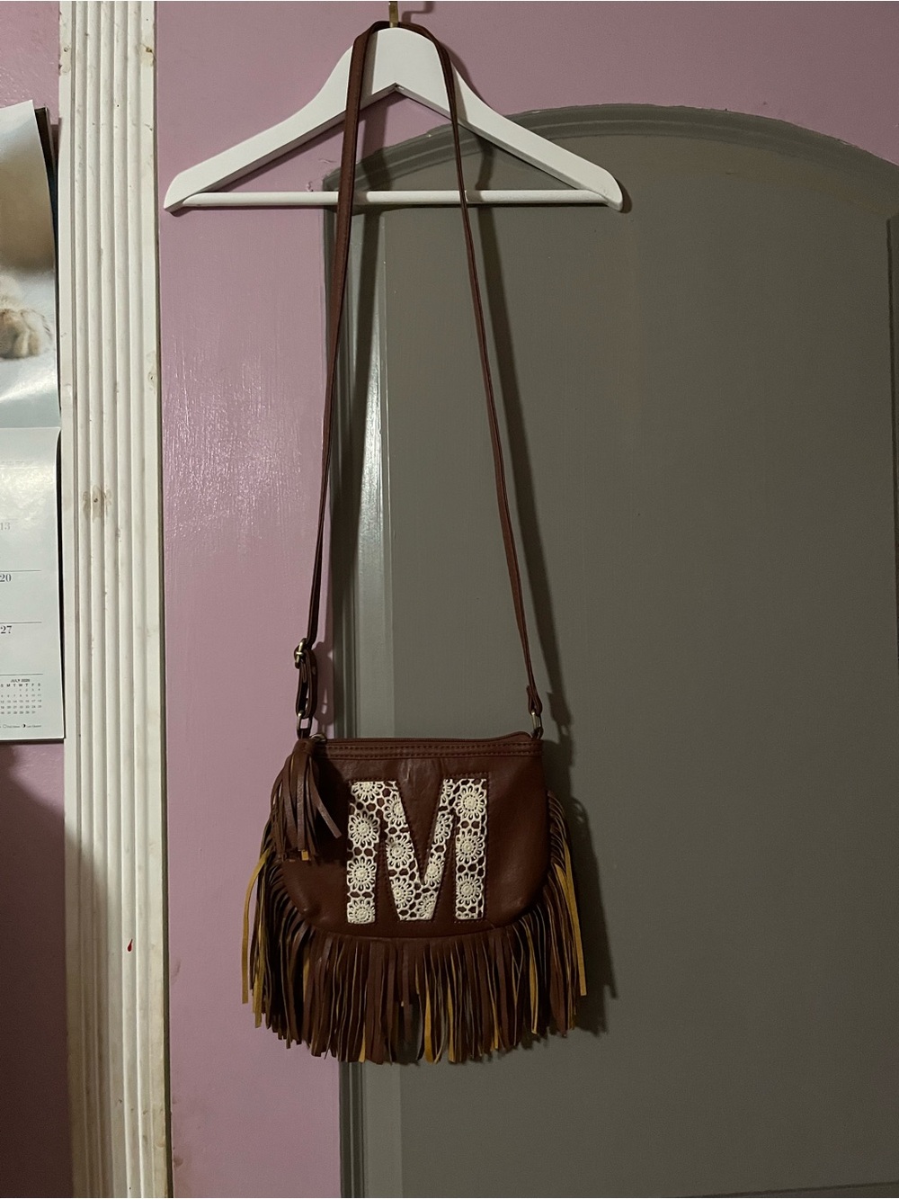 Justice Brown Fringe Crossbody Bag with White Embroidered M